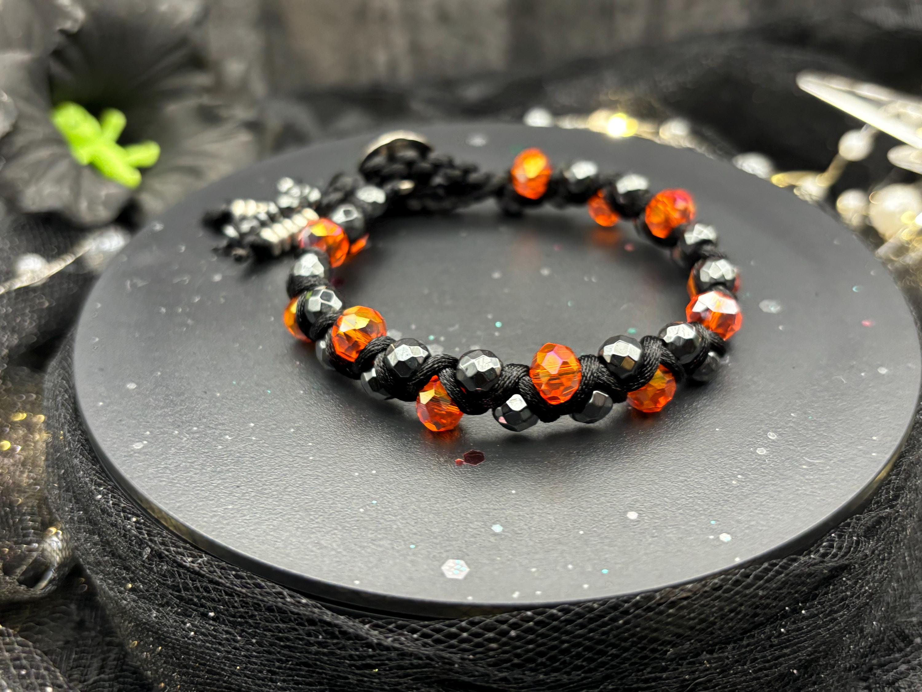 nfernal Glow – Braided Hematite and Crystal Glass Bead Bracelet